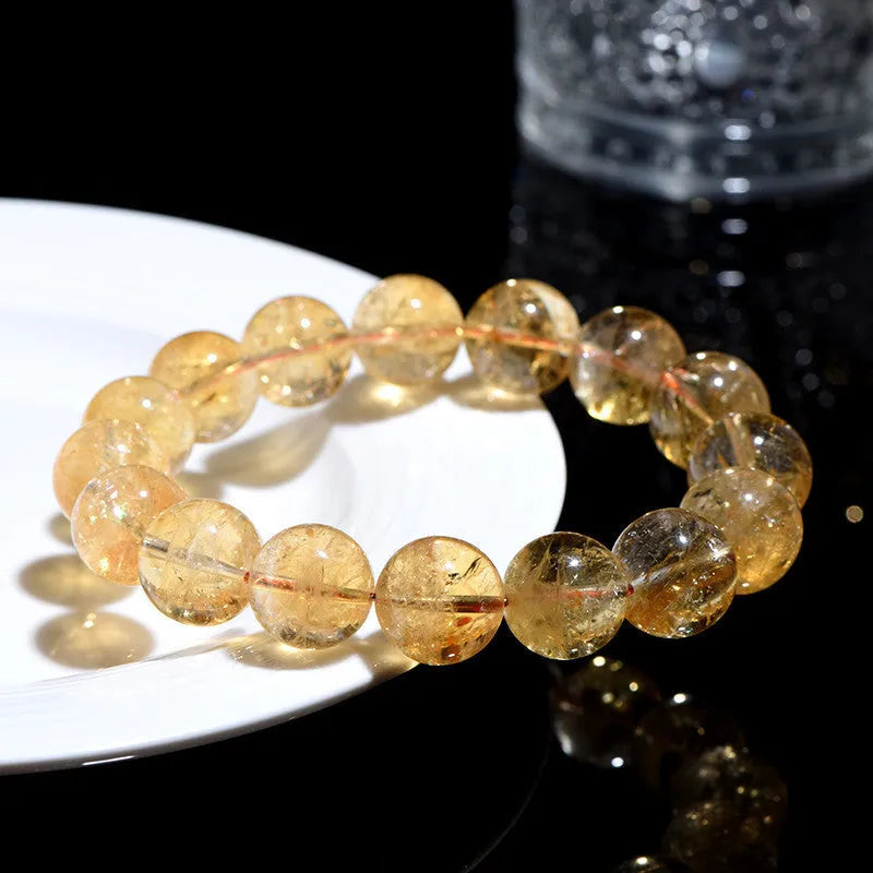 Natural yellow citrine bracelet showing geometry-shaped beads in single-circle configuration