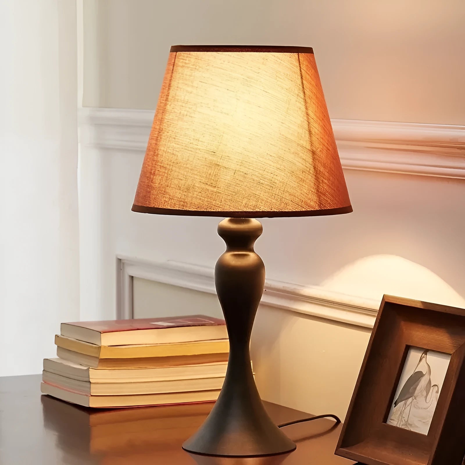 Retro-style alloy metal table lamp with LED light on a wooden surface.