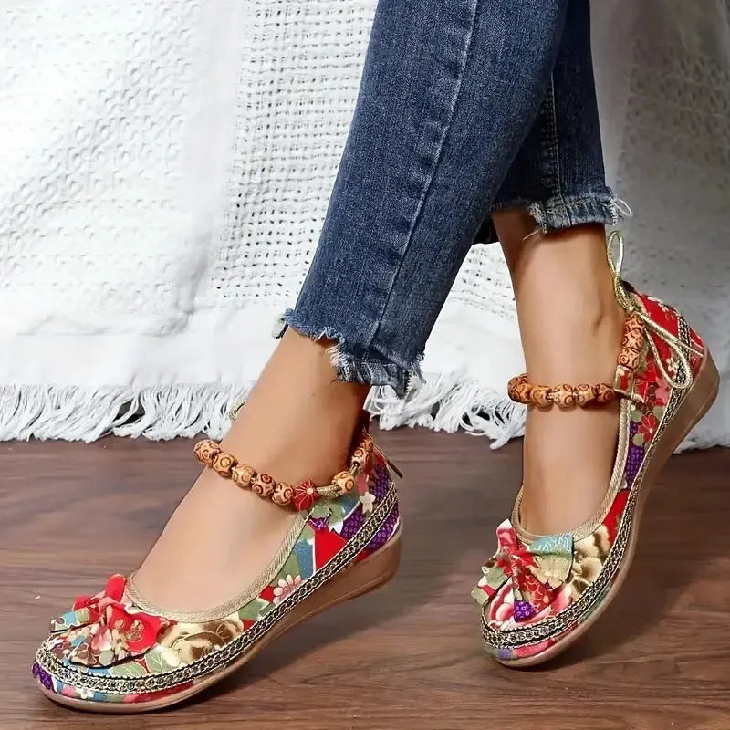 Women's plus size ethnic platform sandals with cloth upper and elastic band fastening in black colour