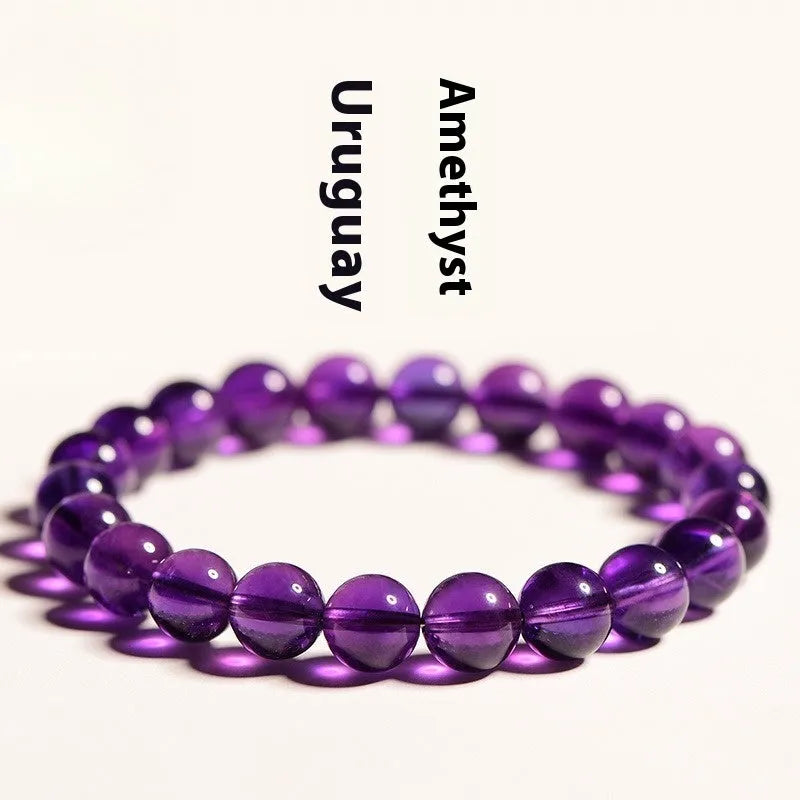 Natural Uruguay amethyst bracelet with scattered beads in four colour grades and eleven size options