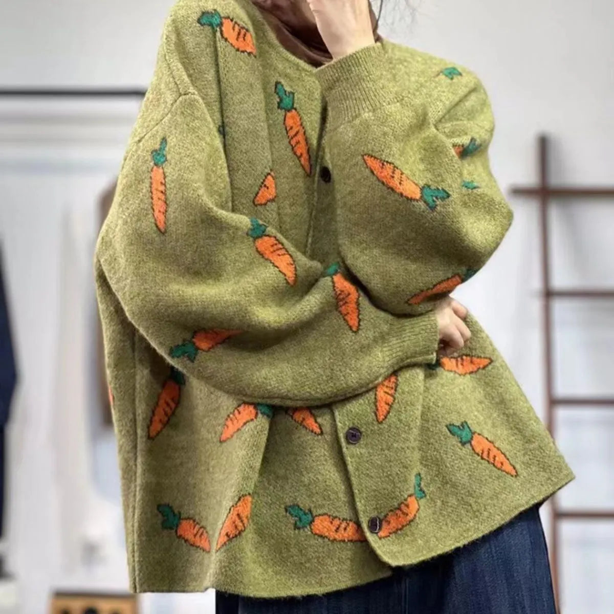 Women's loose round neck cardigan with artistic colour contrast printing, made from viscose fibre.