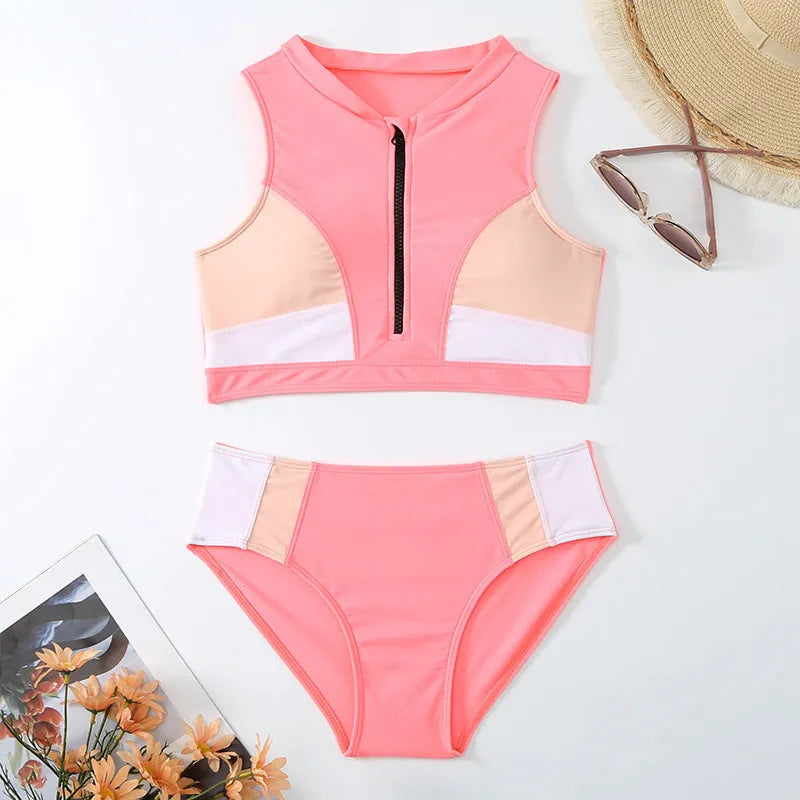 Pink high waist split bikini swimsuit on a mannequin, showing the briefs style and solid colour.