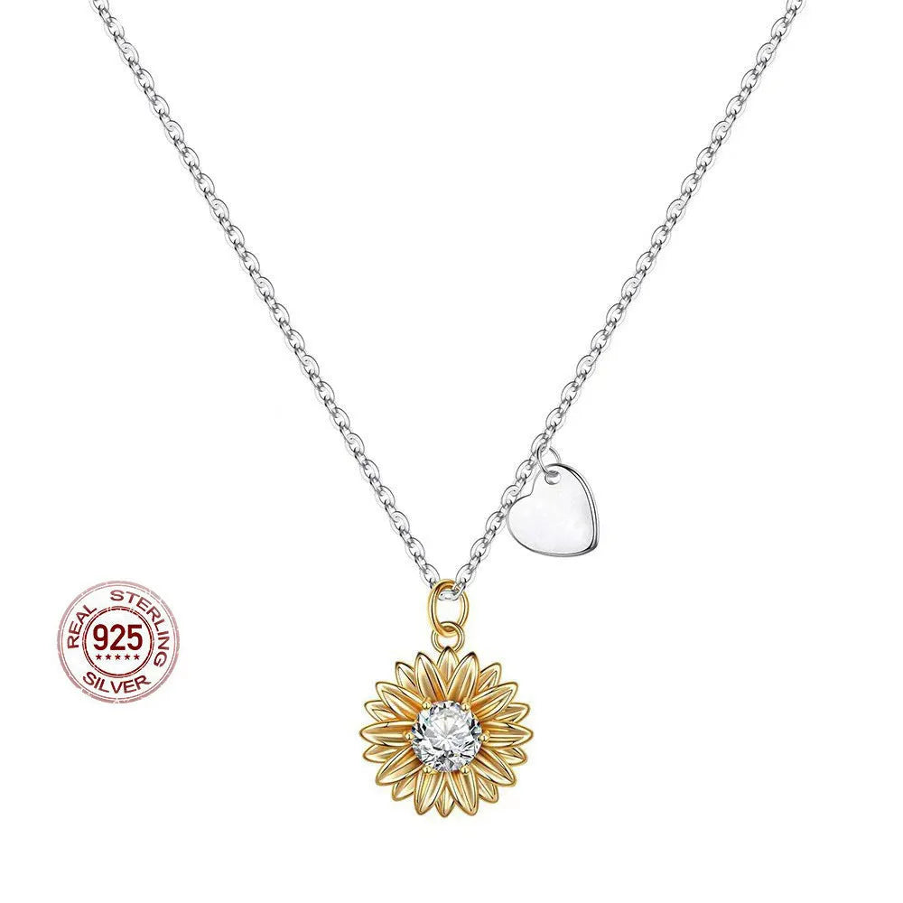 Women's sunflower-themed 925 silver pendant necklace with geometric petals on an adjustable cross chain.