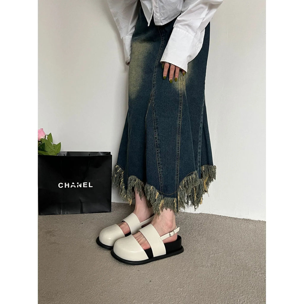 Women's retro sandals with a single ankle strap buckle and closed round toe, shown in apricot colour.