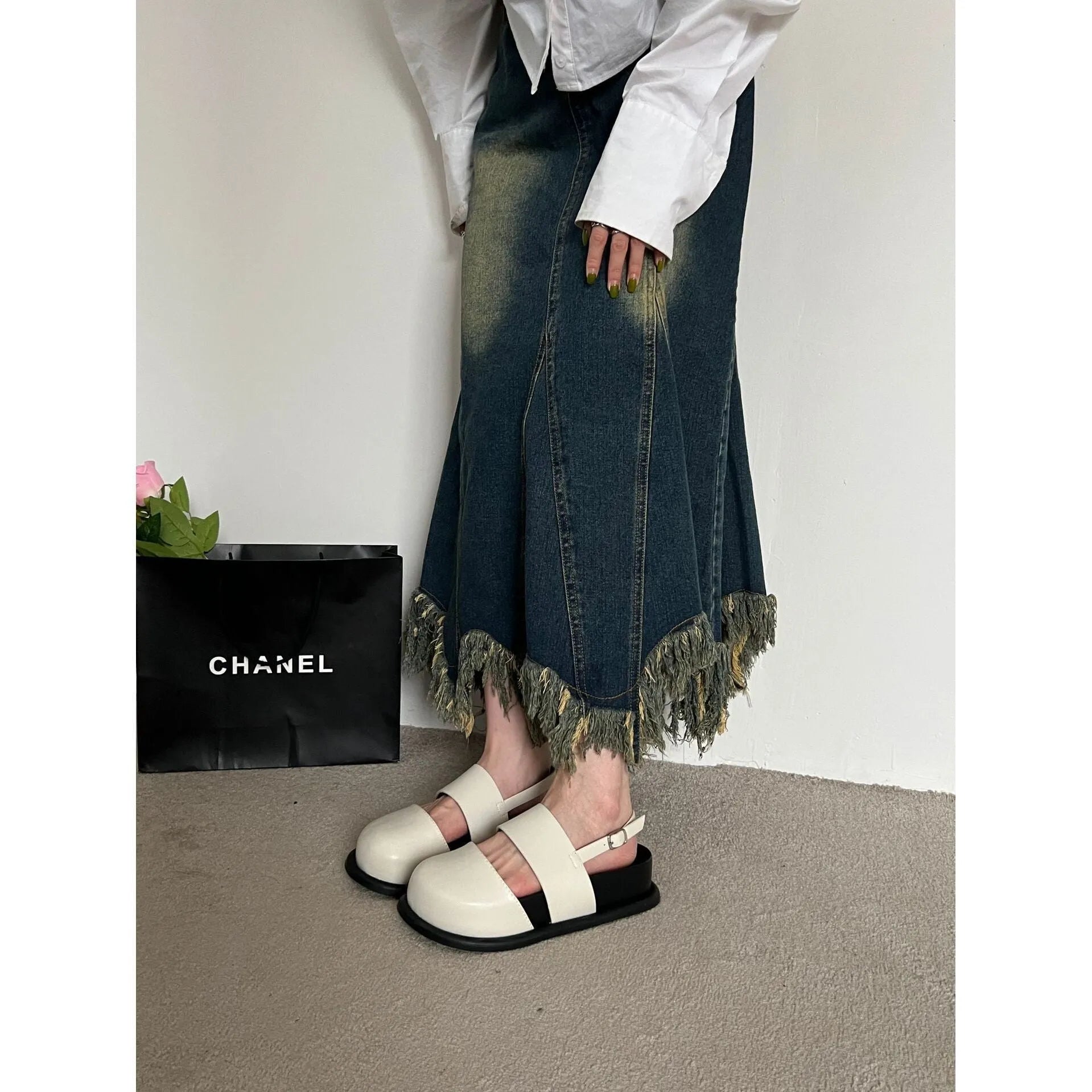 Women's retro sandals with a single ankle strap buckle and closed round toe, shown in apricot colour.