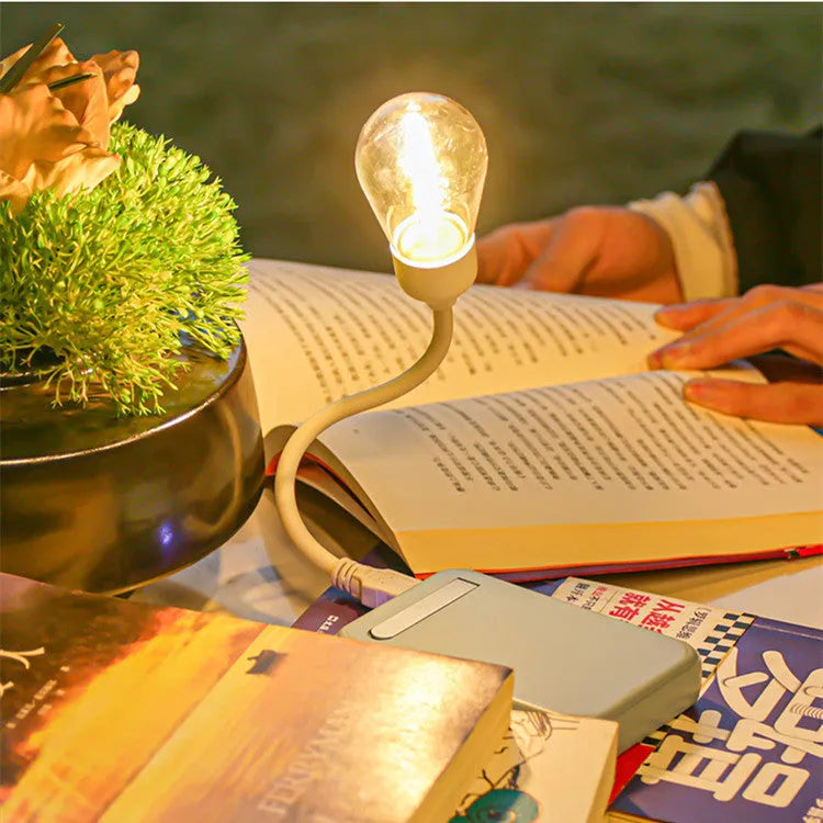 USB rechargeable folding night light with tungsten filament LED bulb in open position