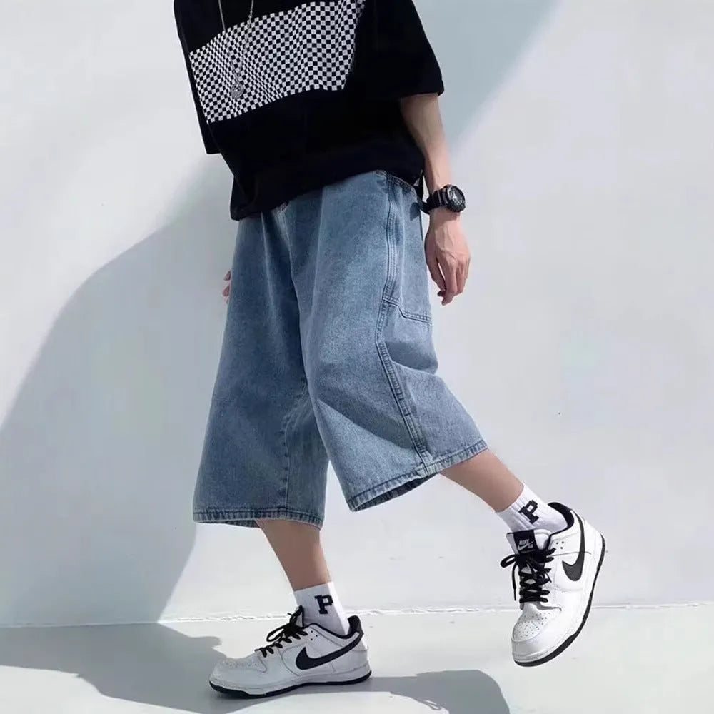 Blue men's denim pirate shorts with high waist, cropped length, and straight legs on a mannequin.