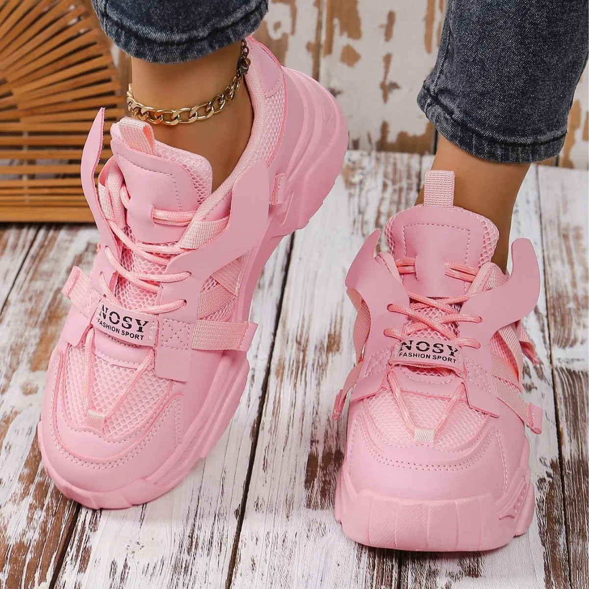 Women's platform sports sneakers in multiple colours with mesh upper and lace-up front.