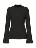Men's black slim fit long sleeve top with lantern sleeves and round neck.