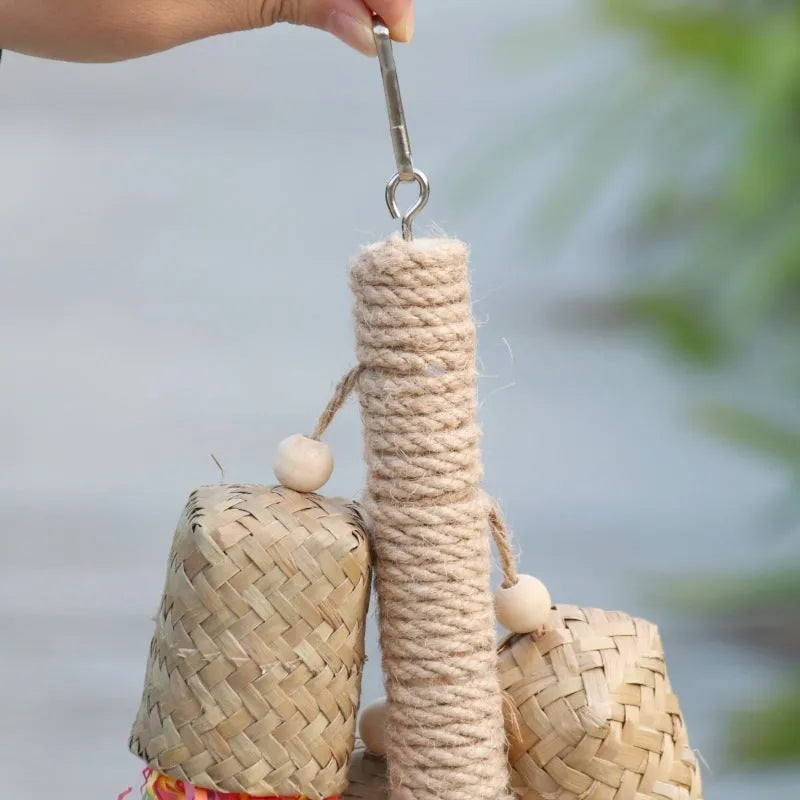 Colourful wooden parrot shredding toy with sisal fibre, measuring 15cm by 35cm.