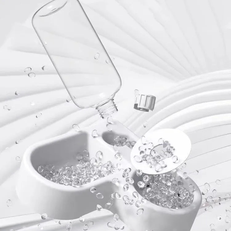 White cat water fountain with food-grade materials and compact design on a kitchen counter.