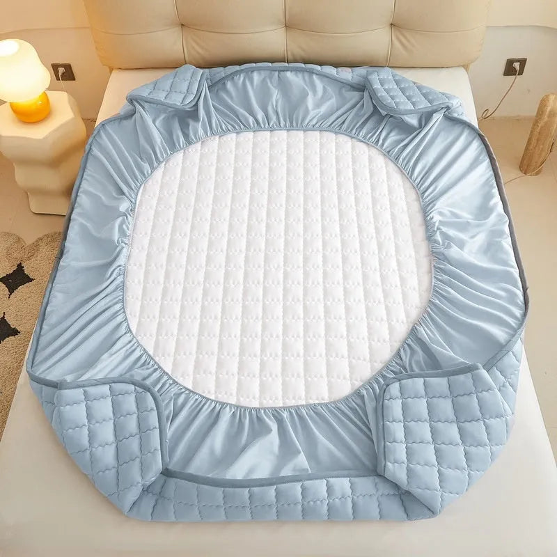 Class A waterproof washed cotton fitted sheet in blue, shown fitted on a mattress corner.
