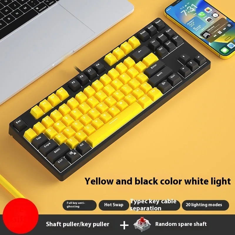 87-key wired mechanical gaming keyboard with colourful keycaps on a metal frame, shown with key puller and cable.