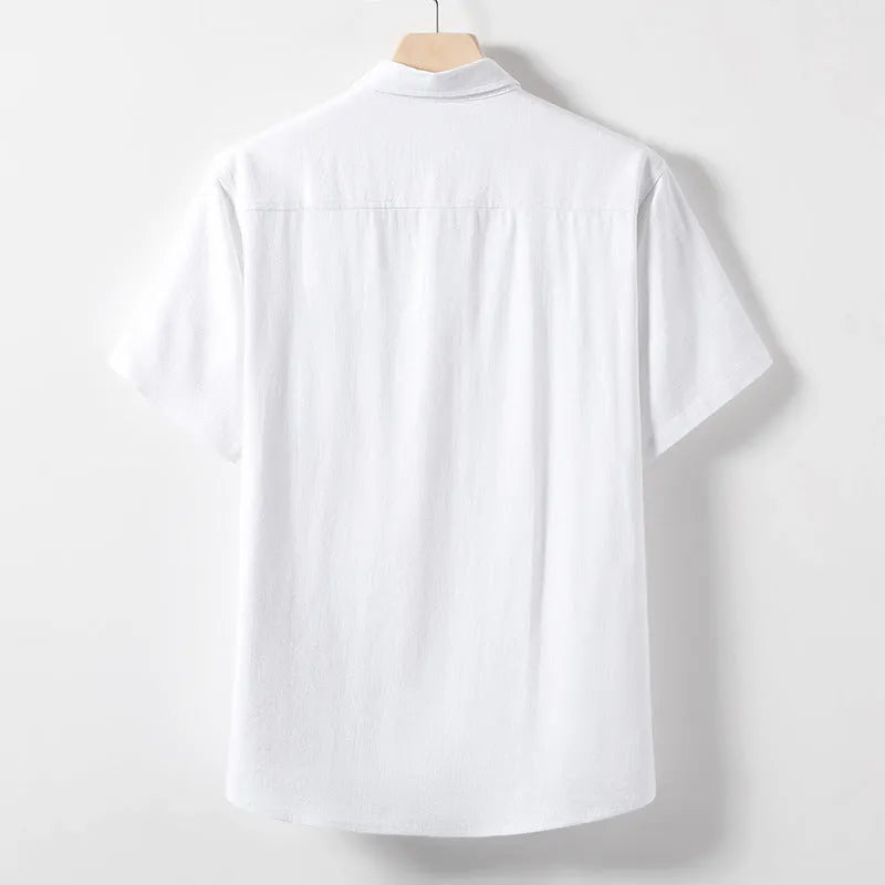 A man's loose-fit linen T-shirt with a lapel collar and short sleeves, shown in a hemp blend fabric.