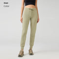 Women's high-waist yoga pants with drawstring waistband in quick-drying cotton blend fabric