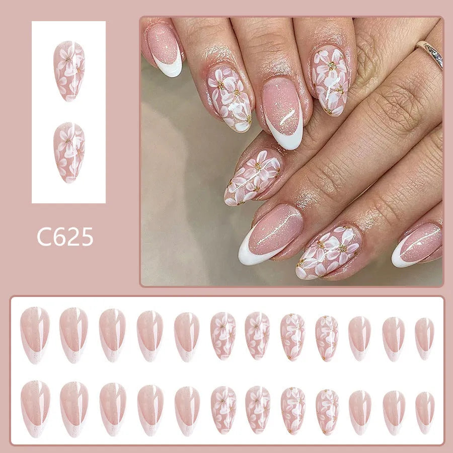 Removable artificial nails with French style glitter flowers on short almond shape in colour C625