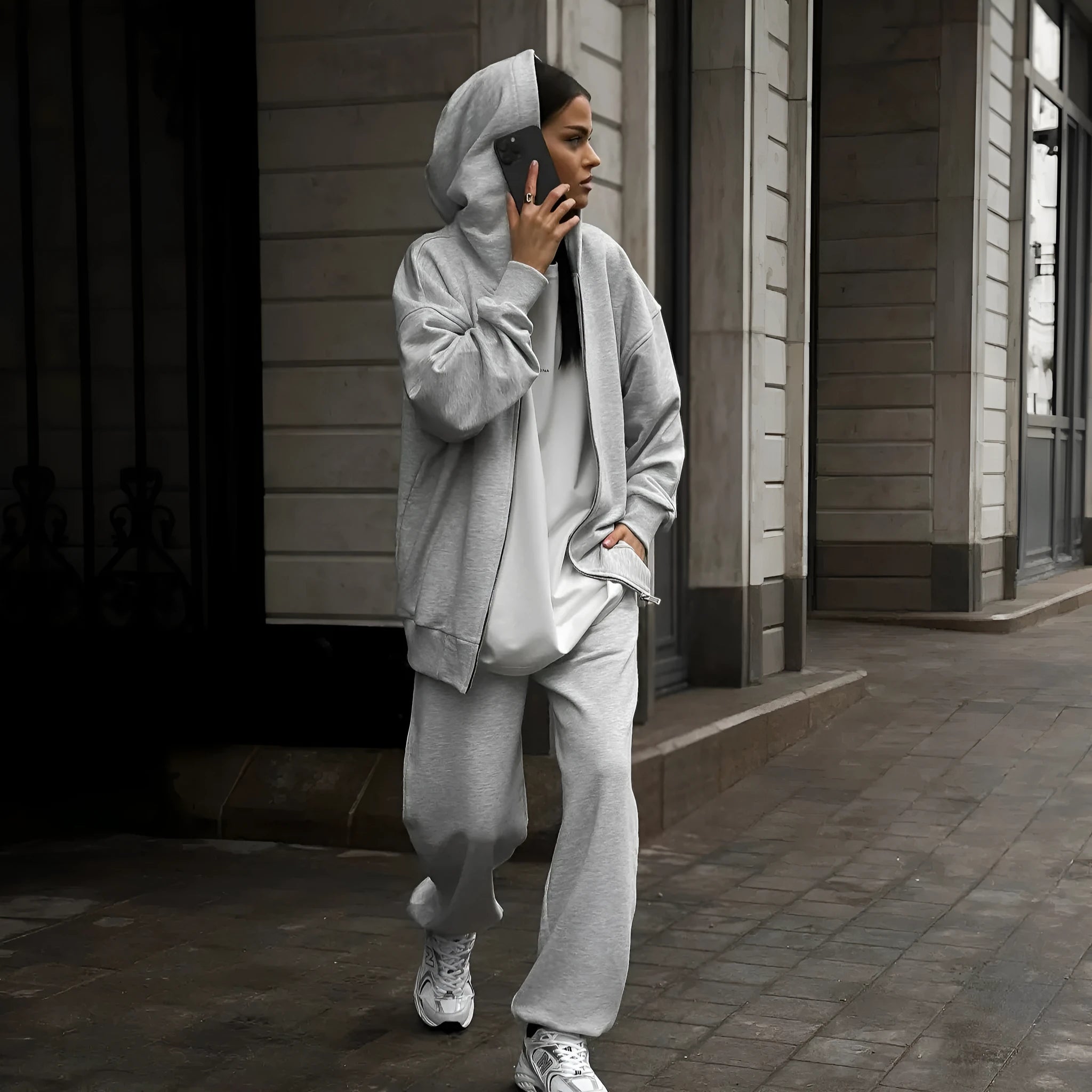 Red loose fit street style coat and trousers two-piece set on a model