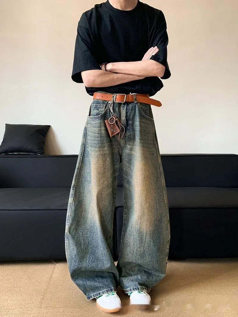 Men's retro blue distressed denim wide-leg pants with vintage styling and slimming silhouette