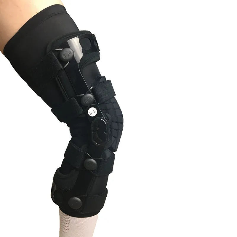 Black anterior ligament knee pad supporter showing multi-material construction and buckle fastenings.