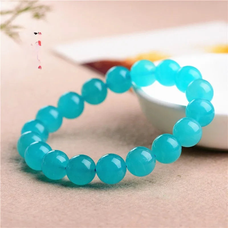Grade 7A Amazonite scattered beads in ice colour with polishing treatment, showing natural gemstone variations