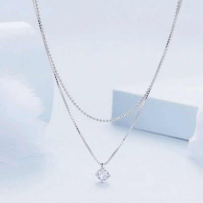 S925 sterling silver double-layer necklace with pearl chain and pendant for women.