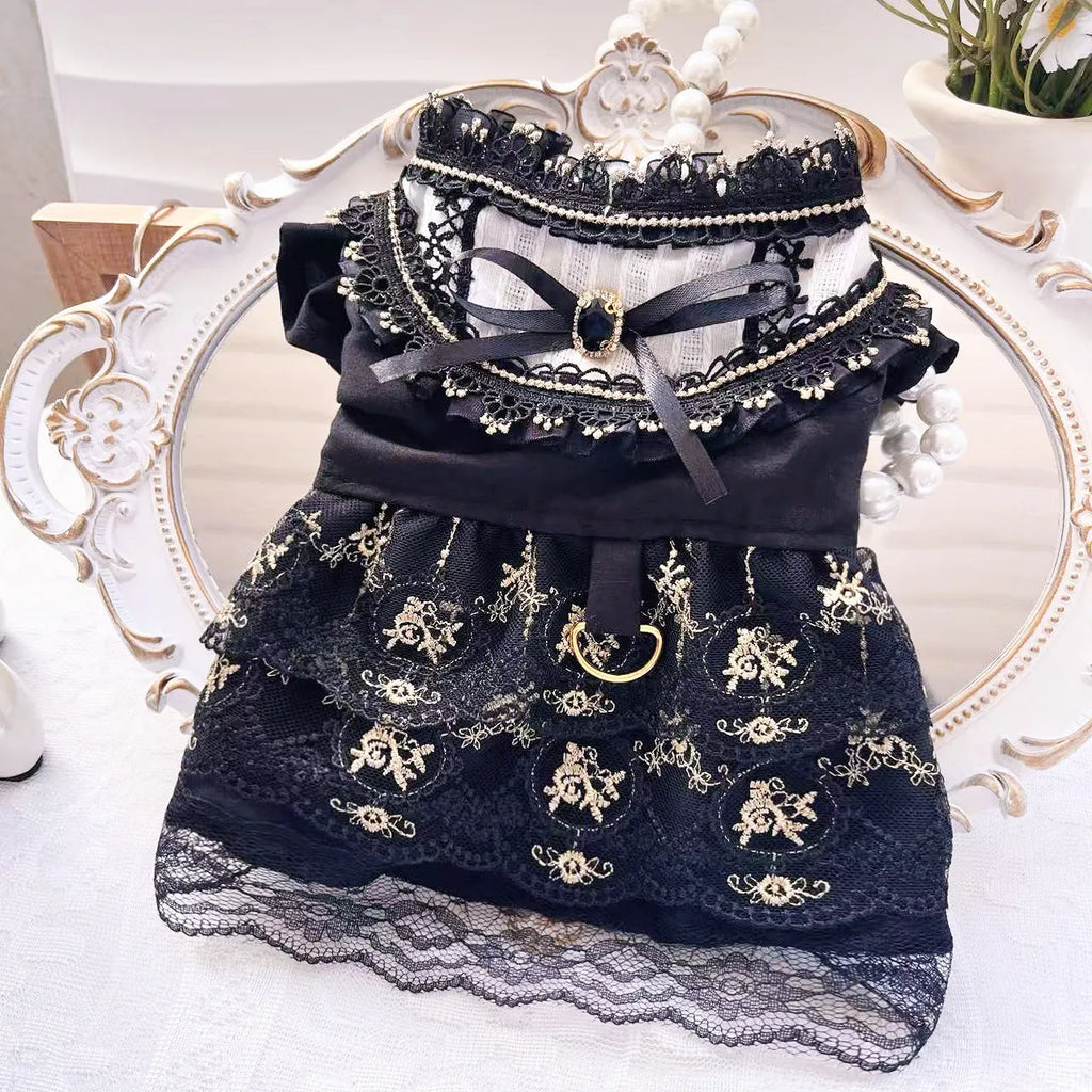 Gold Gothic princess style dress for a small dog or cat on a hanger