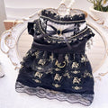 Gold Gothic princess style dress for a small dog or cat on a hanger