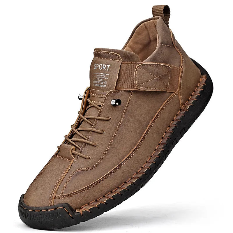 Men's mid-top Martin boot in a solid colour with elastic band, round toe, and tooling stitching on the rubber sole.