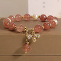 Women's strawberry quartz and freshwater pearl bracelet with bee charm and zircon accents