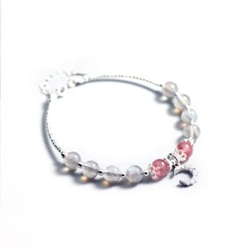 Handmade natural moonstone bracelet with crescent moon charm on adjustable chain