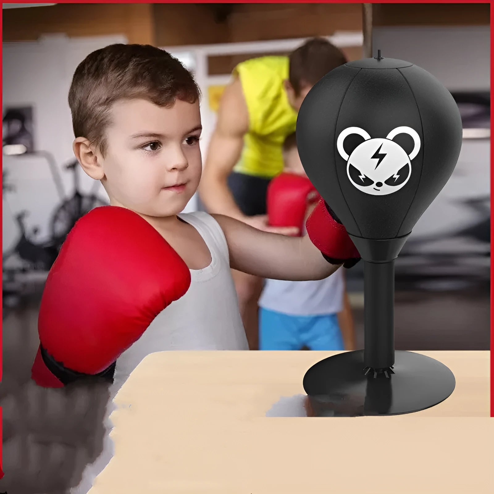 Tabletop boxing speed ball with black PU leather inflatable ball on desk using suction cup base for reflex training and stress relief.