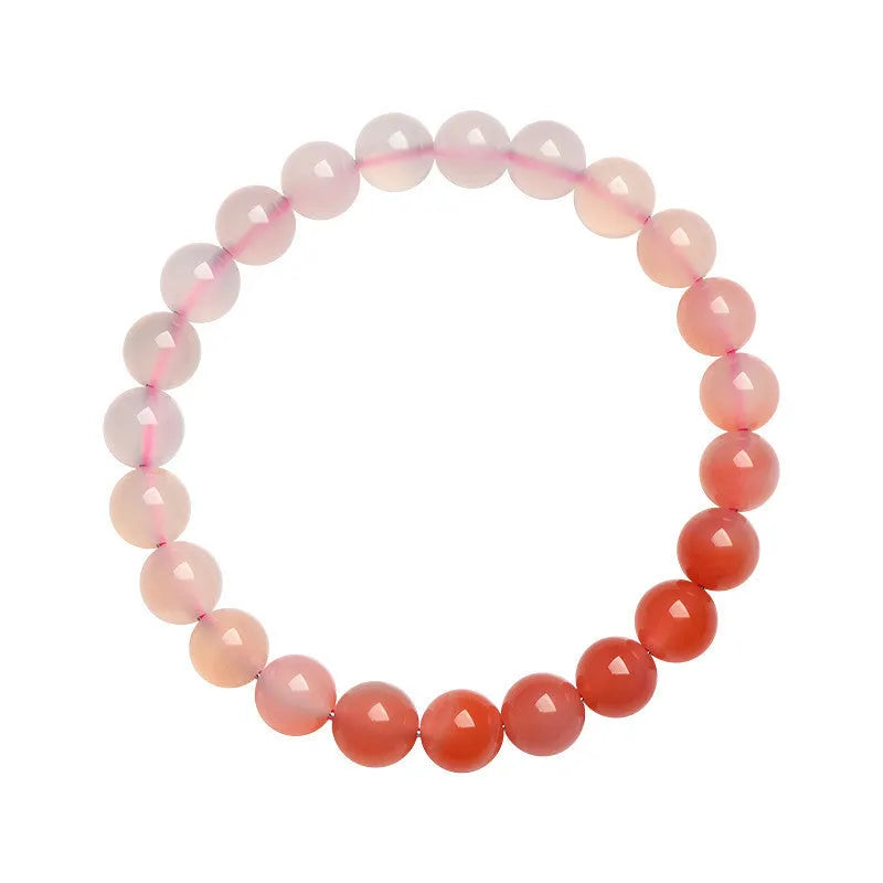 Natural gradient Yanyuan agate bracelet in geometric single-circle design on a neutral background.