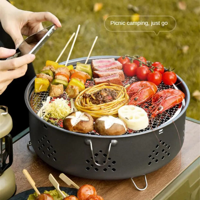 Portable stainless steel charcoal barbecue grill with detachable parts and storage bag for outdoor use