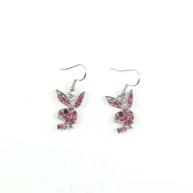A pair of cute cartoon rabbit stud earrings for women in silver, pink, or gold colour.
