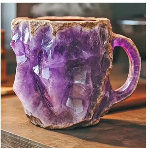 A solid purple resin coffee mug with a handle on a white background.