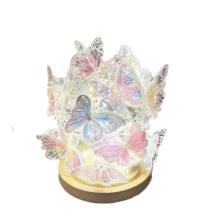 Butterfly night lamp with glass shade and raw wood base measuring 12x15cm