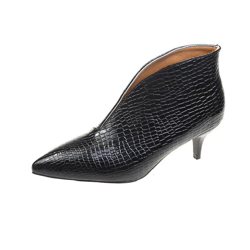 Women's V cut pointed embossed chunky heel Martin boots in artificial PU, black colour, low tube length