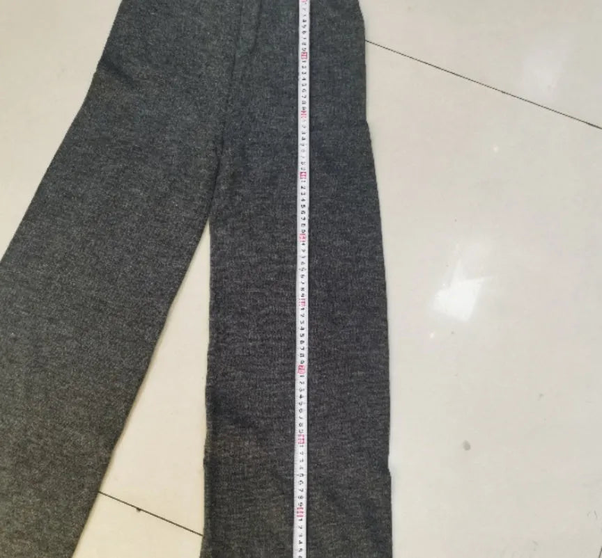 Women's side-slit acrylic sweater suit with matching trousers in solid colour options