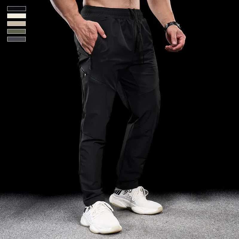 Men's waterproof quick-dry workout trousers in nylon fabric showing colour options