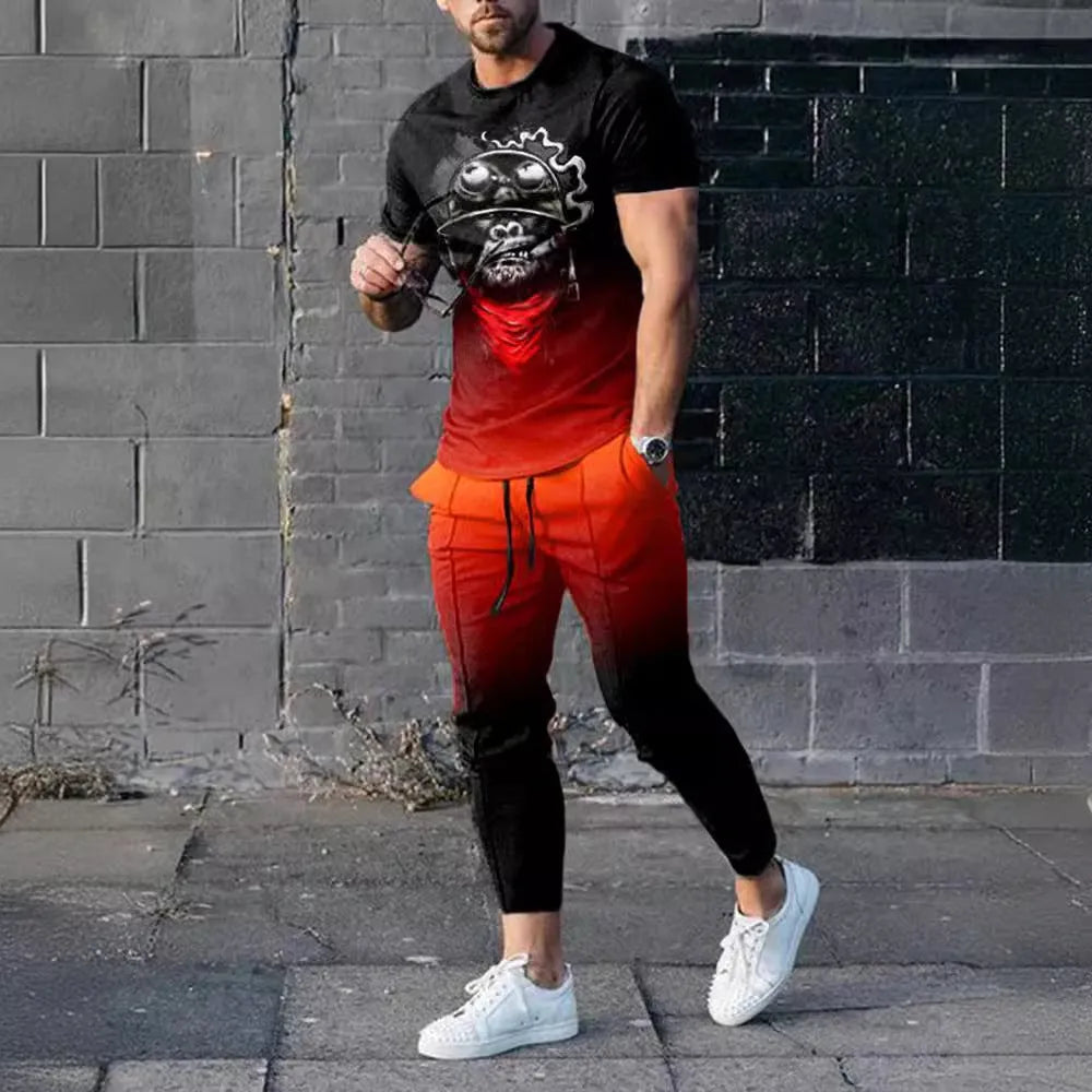Man wearing a light grey short-sleeved pullover and matching trousers from a men's two-piece tracksuit set.