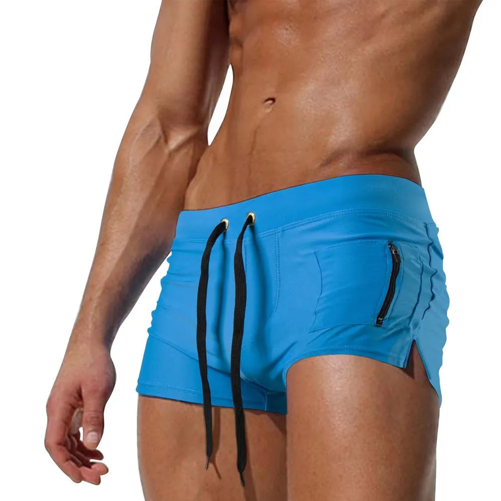 Men's high waist lace-up swimming trunks in a solid colour, shown in a briefs style.