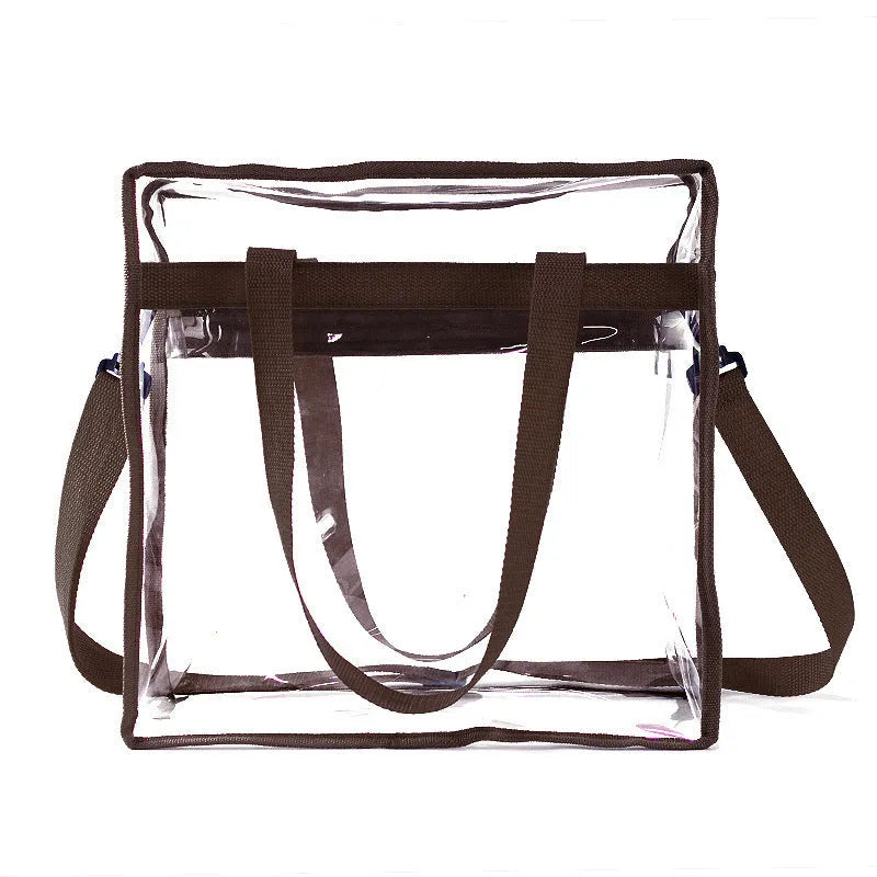 Women's transparent PVC shoulder messenger bag showing front organisation and double strap connector