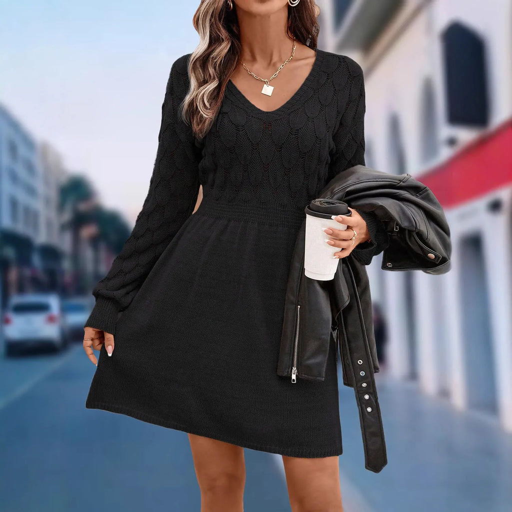 Women's apricot V-neck dress with long sleeves, high waist and a textured 3D pattern detail.
