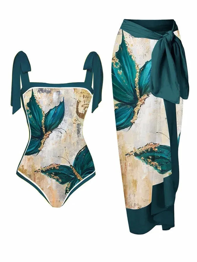Women's printed two-piece chiffon swimsuit with matching hip skirt in a floral design.
