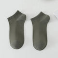 Men's solid colour low-cut polyester boat socks showing breathable fabric texture