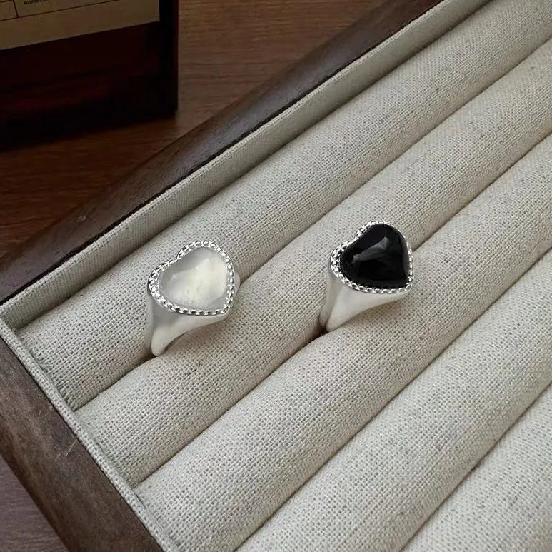 S925 sterling silver adjustable ring with a heart-shaped black agate stone.