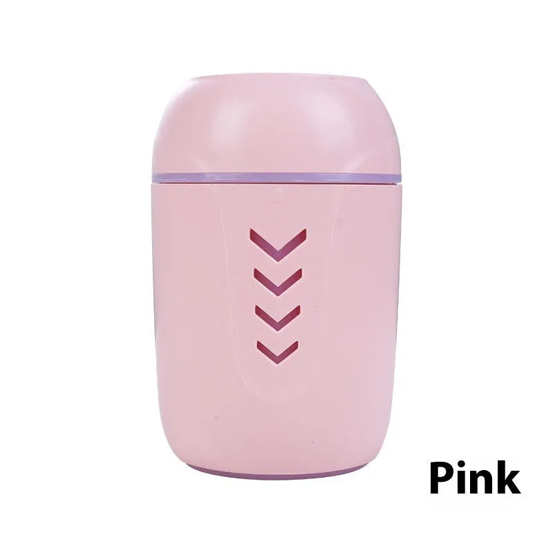 Round desktop air purifier with aromatherapy in blue, showing single fog outlet and USB cable