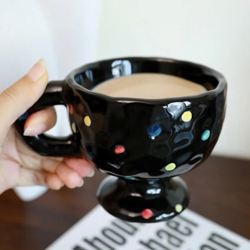 Hand-pinched irregular shaped ceramic mug in solid colour, 250ml capacity