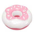 Donut-shaped dog chew toy in pink with textured surface for dental hygiene
