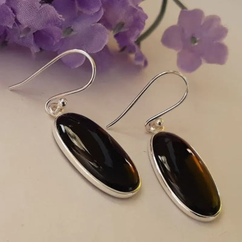 Women's geometric earrings with oval black agate pendants on silver-coloured alloy